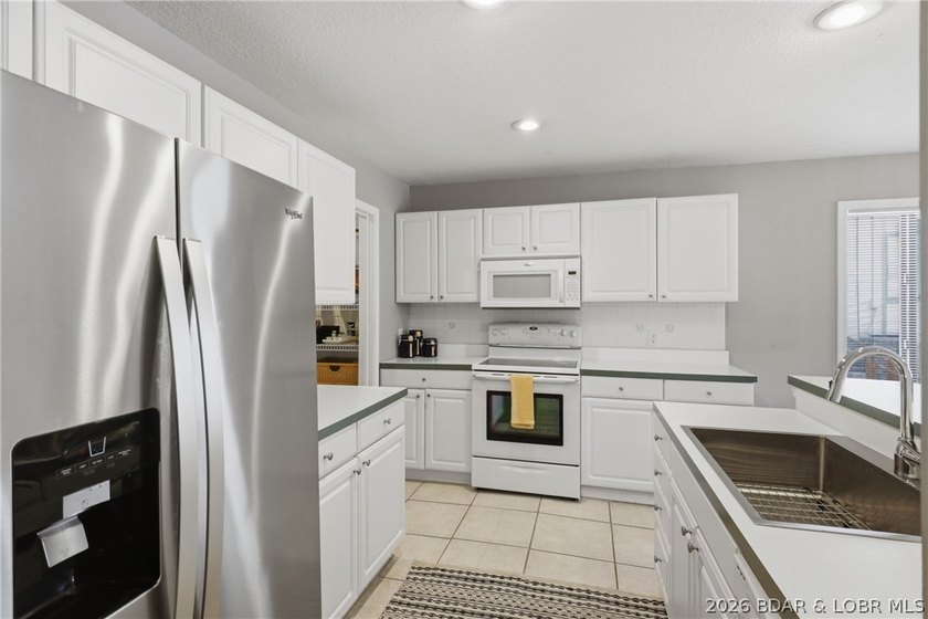 Welcome to your two-level lakefront retreat in the heart of the - photo 10