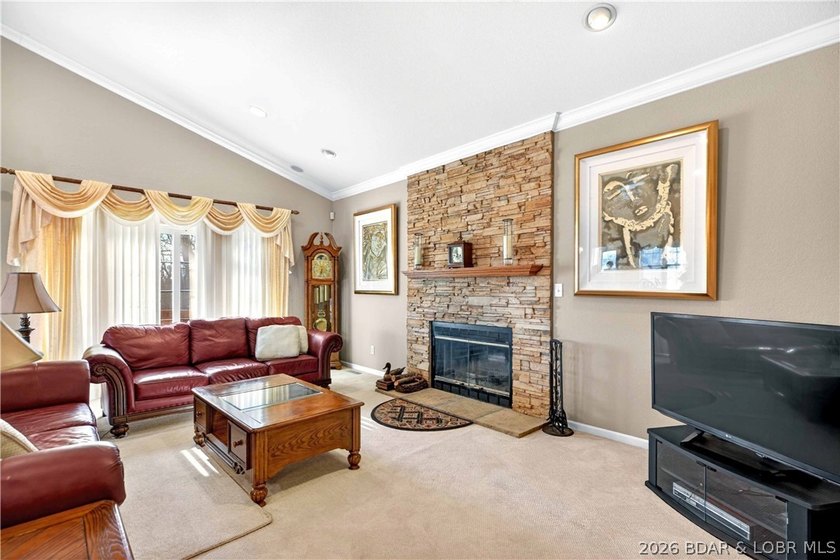 6835 Saint Tropez Circle in Osage Beach offers inviting Lake of - photo 8