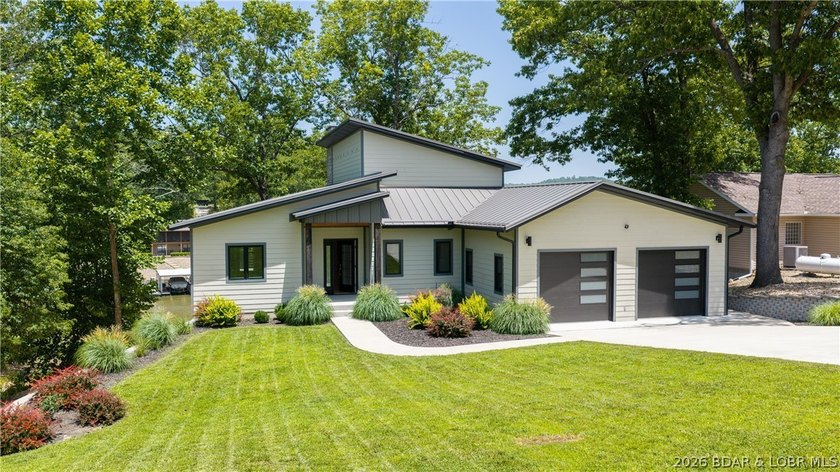 Experience Open Space Luxury lakefront living in this custom - photo 2