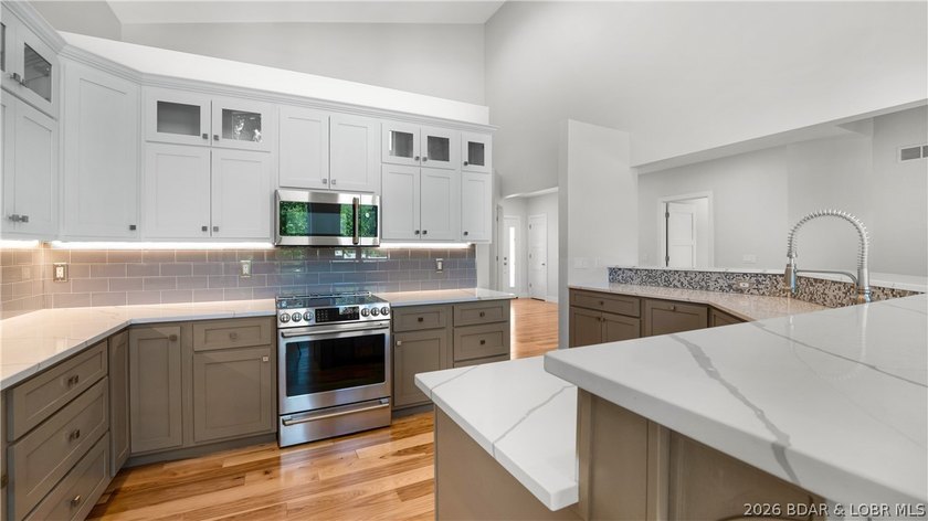 Experience Open Space Luxury lakefront living in this custom - photo 3