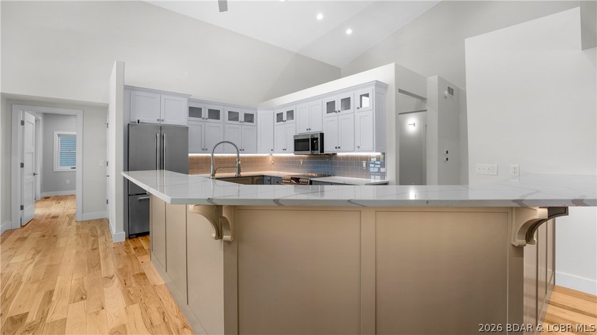 Experience Open Space Luxury lakefront living in this custom - photo 9