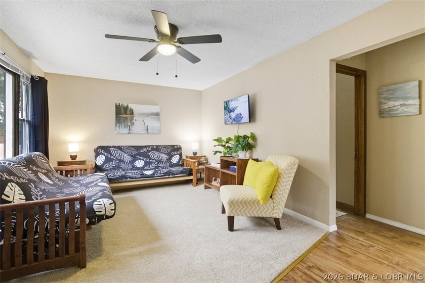 Lake living without the waterfront price! Welcome to this - photo 4