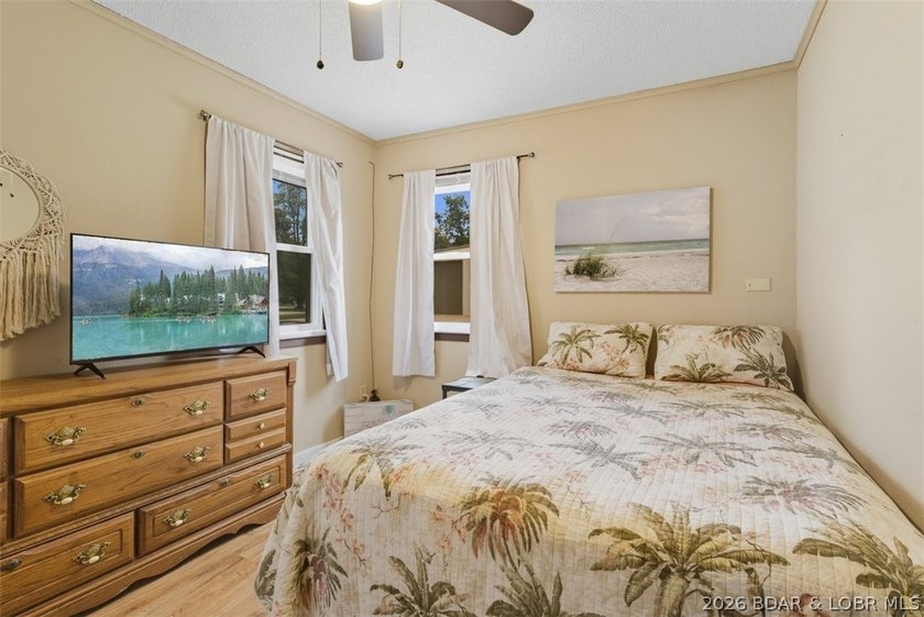 Lake living without the waterfront price! Welcome to this - photo 8