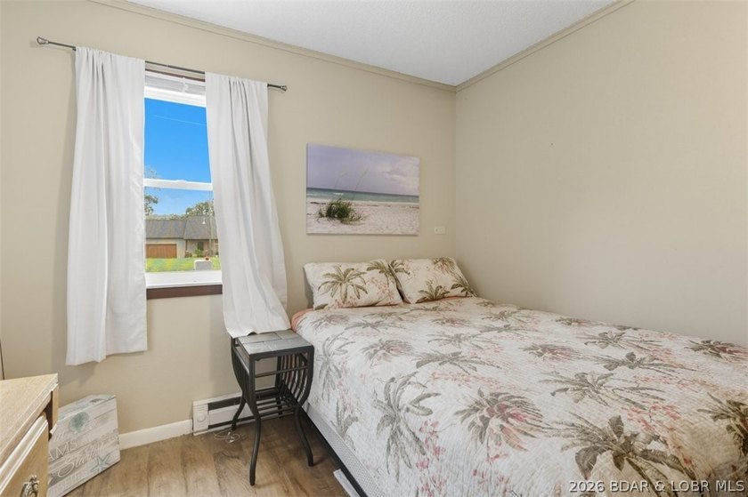 Lake living without the waterfront price! Welcome to this - photo 9