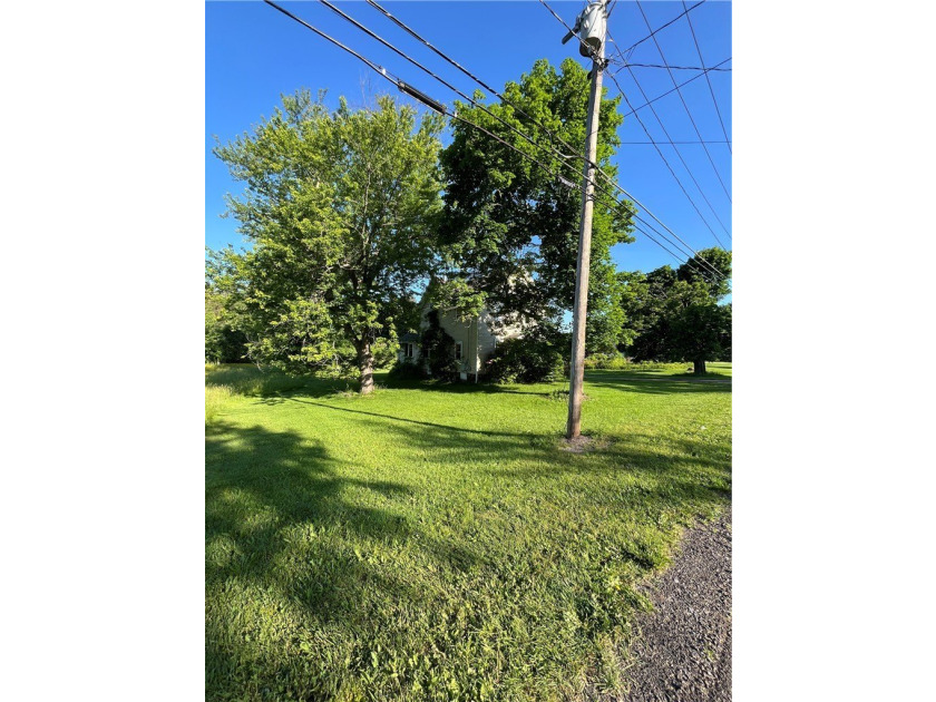 Discover the potential at 6705 E Townline Rd, Williamson, NY - photo 3