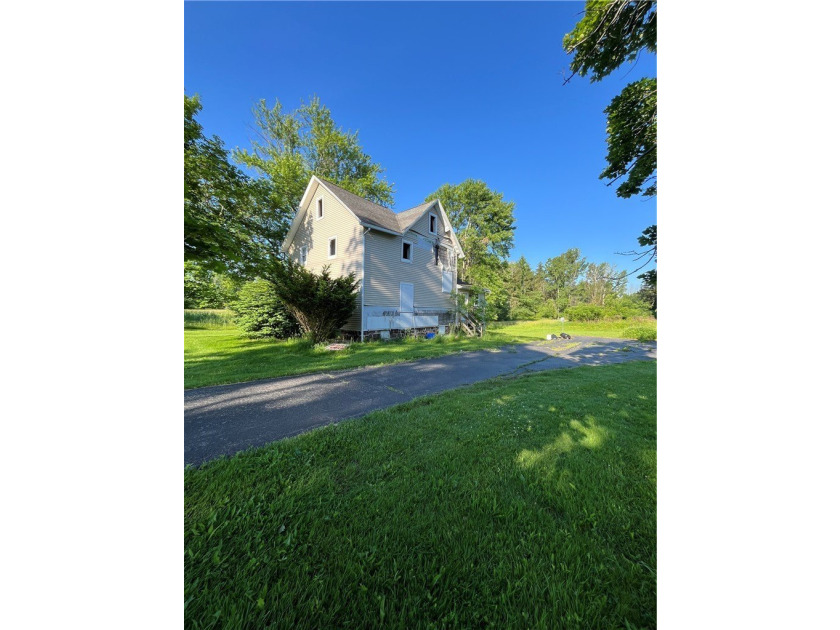 Discover the potential at 6705 E Townline Rd, Williamson, NY - photo 4