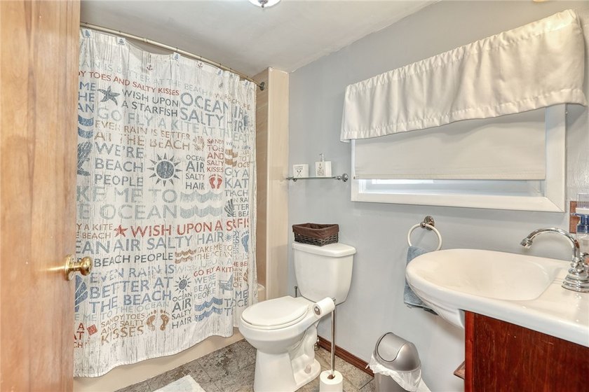 Tucked into the hillside, this awesome lakefront home offers so - photo 22