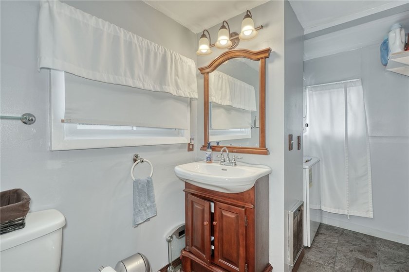 Tucked into the hillside, this awesome lakefront home offers so - photo 23
