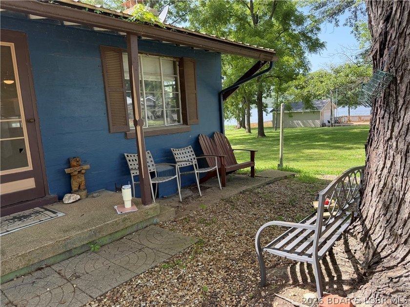 Rare 4-Lot Lakefront Property;Bonus Dock Lot Embrace this - photo 3