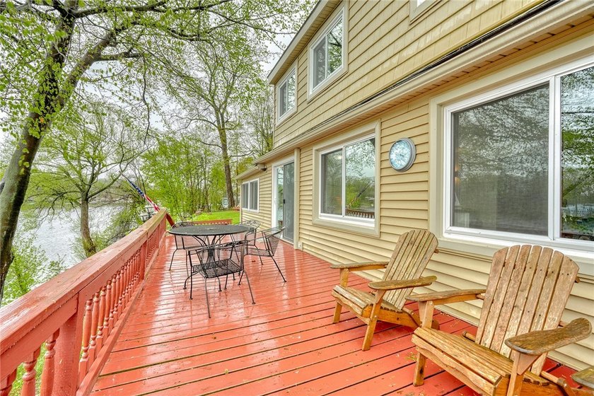 Tucked into the hillside, this awesome lakefront home offers so - photo 36
