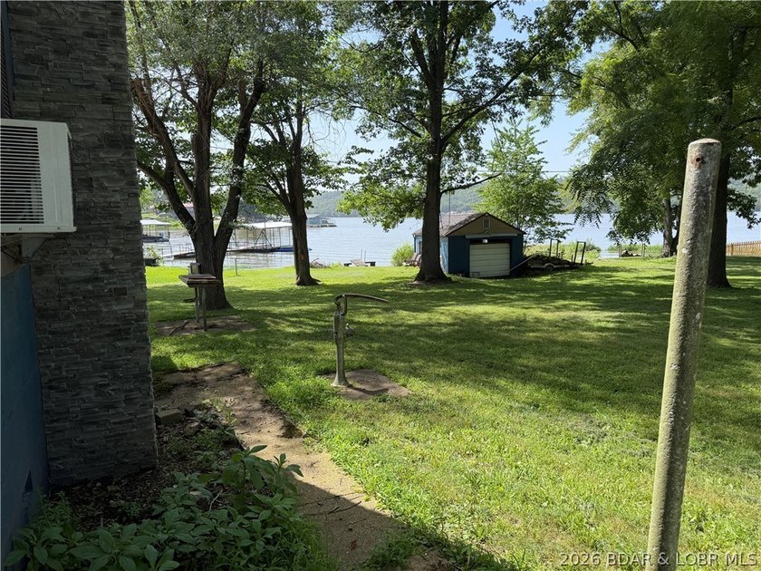 Rare 4-Lot Lakefront Property;Bonus Dock Lot Embrace this - photo 9