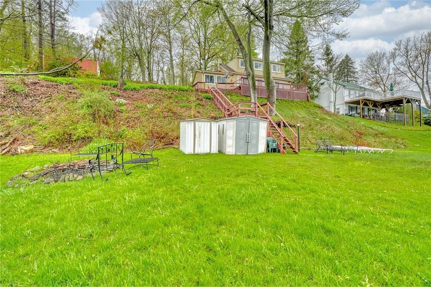 Tucked into the hillside, this awesome lakefront home offers so - photo 43