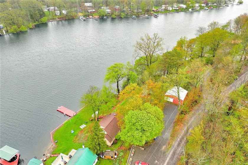 Tucked into the hillside, this awesome lakefront home offers so - photo 48