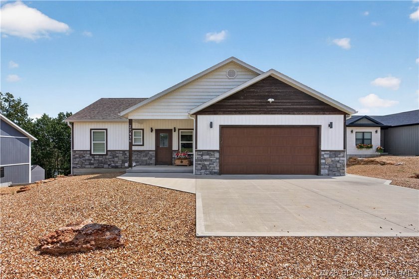 Enjoy waterfront living in this stunning 4-bedroom, 2.5-bath - photo 2
