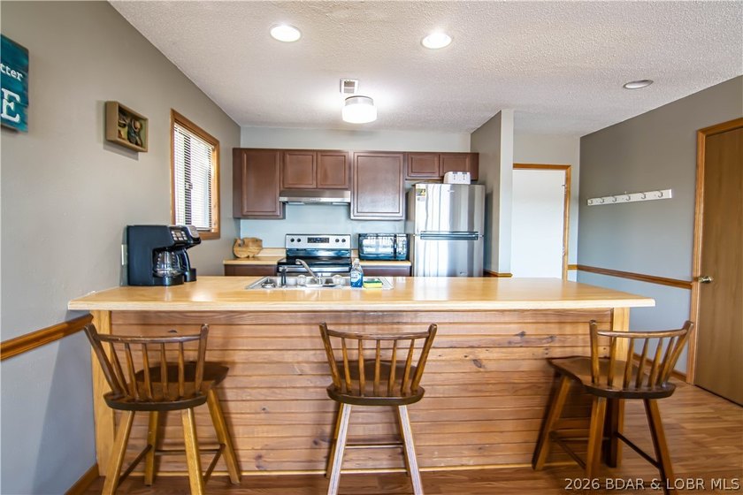 PERFECT LAKE PACKAGE!!! Turn Key Condo that includes 10x24 boat - photo 3