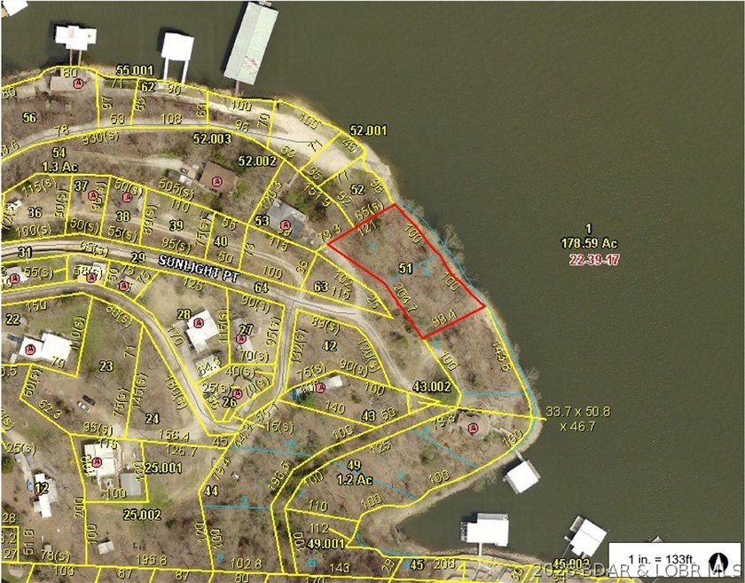 Enjoy over 200 feet of lakefront with deep water, expansive main - photo 3