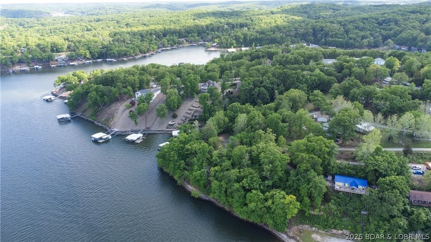 Enjoy over 200 feet of lakefront with deep water, expansive main - photo 6