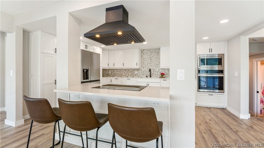 This rare lakefront villa-esque condo is one of only 2 units in - photo 10
