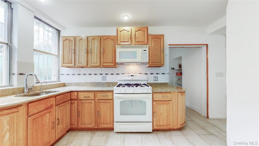 Welcome to 276 Woodbine Street, a substantial multi-family - photo 4