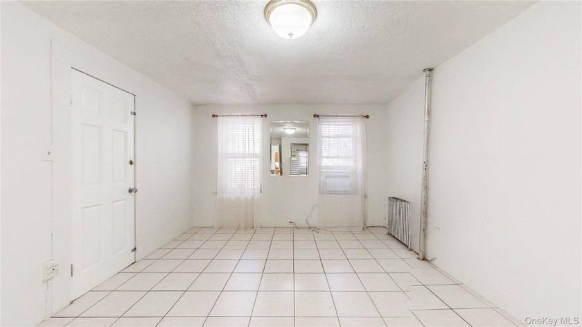 Welcome to 276 Woodbine Street, a substantial multi-family - photo 6