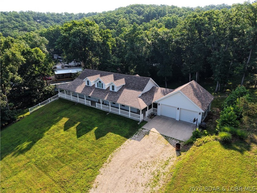 Lakefront Oasis! Discover this exceptional 5,200+ sq ft custom - photo 2