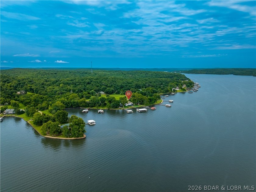 Hard-to-find one-level lakefront living at the 49-mile marker! - photo 9