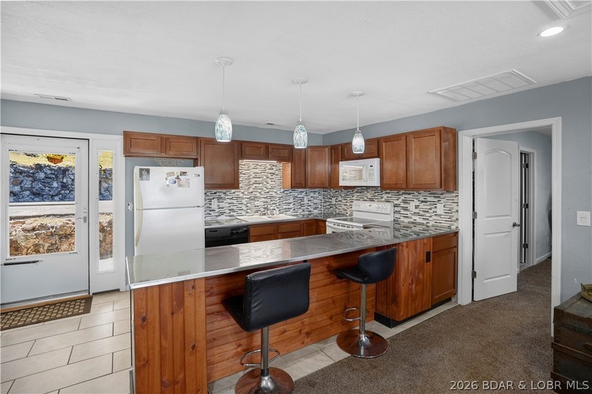 Enjoy panoramic lake views of the 4 Mile Marker from this - photo 6