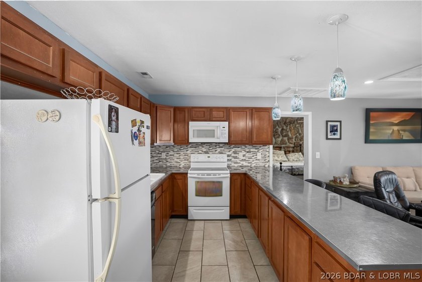 Enjoy panoramic lake views of the 4 Mile Marker from this - photo 8