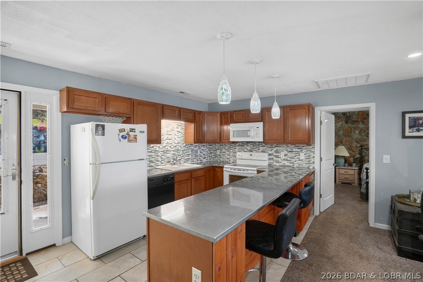 Enjoy panoramic lake views of the 4 Mile Marker from this - photo 9