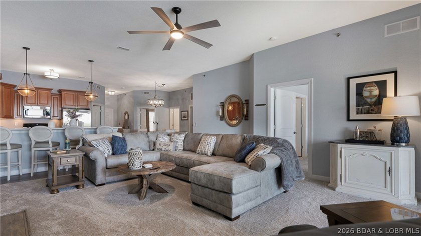 Experience refined lakefront living in this fully updated - photo 4