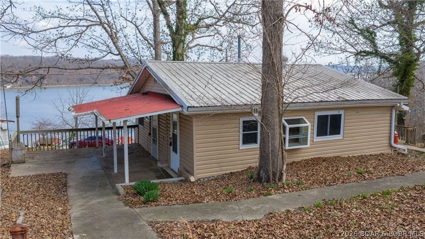 Discover affordable lake living at its best! Nestled in a - photo 3