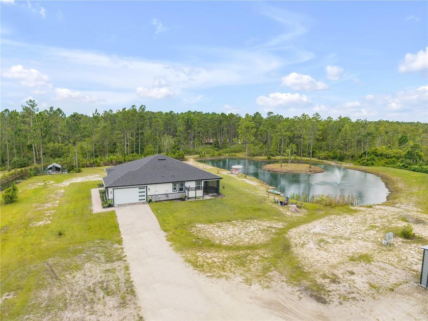 Behind the gated entry, a private estate unfolds across more - photo 8