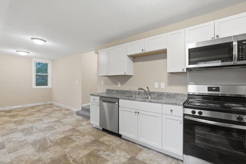 Completely Renovated Duplex with $70K+ in Updates! Exceptional - photo 15