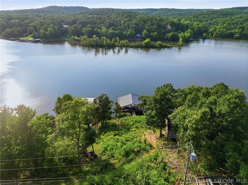 Build your dream lake home on this exceptional waterfront lot in - photo 4