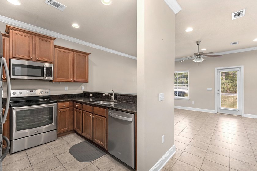 Spacious 3-bedroom, 2.5-bathroom townhome located just minutes - photo 7