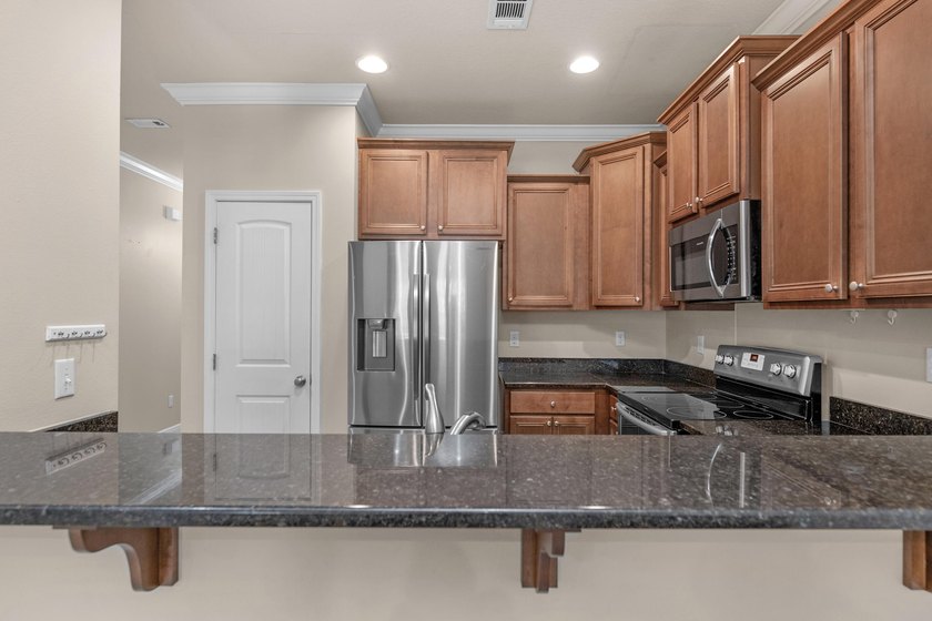 Spacious 3-bedroom, 2.5-bathroom townhome located just minutes - photo 8