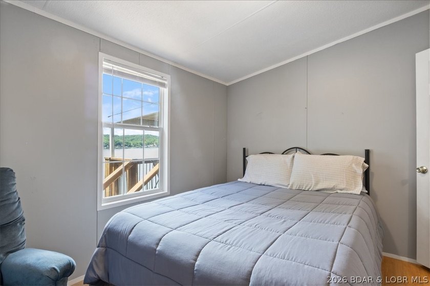 Discover this beautifully updated 4-bedroom, 3-bath lakefront - photo 10
