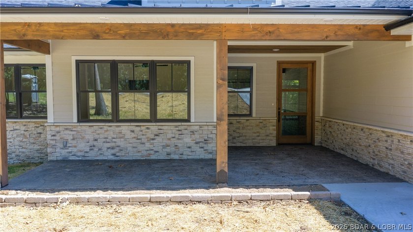 This newly constructed home showcases exceptional craftsmanship - photo 3