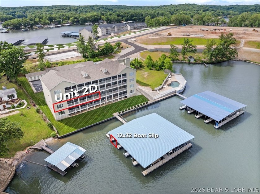 Enjoy panoramic lake views and outstanding value in this - photo 2