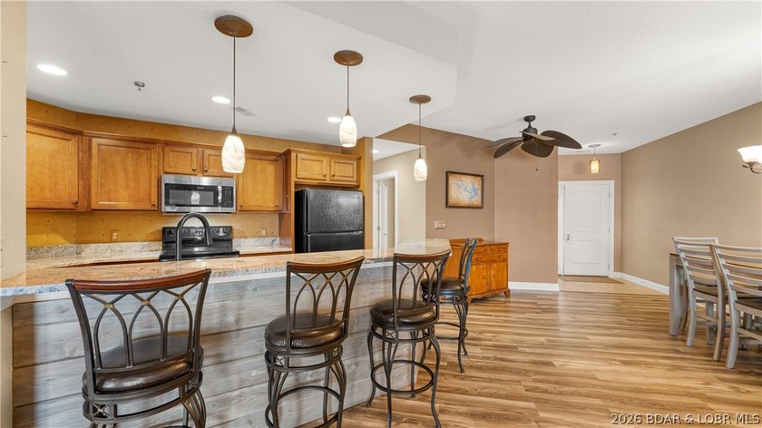 Enjoy panoramic lake views and outstanding value in this - photo 7