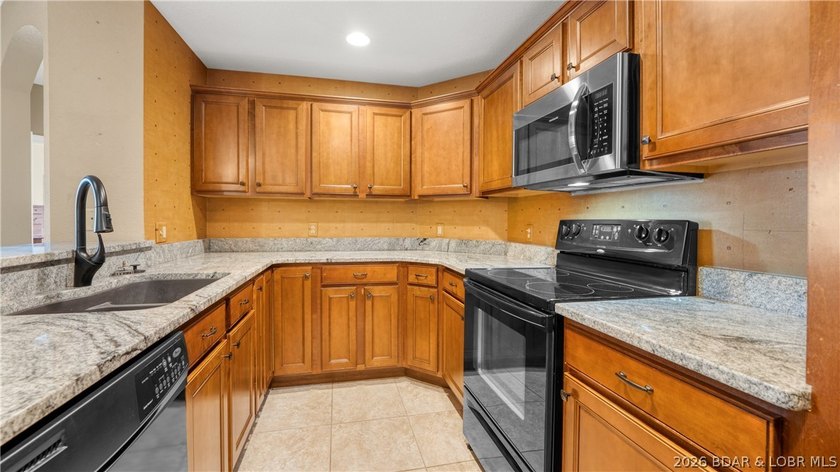 Enjoy panoramic lake views and outstanding value in this - photo 9