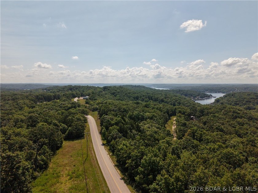 Discover the possibilities with this 6.8-acre wooded tract in - photo 3