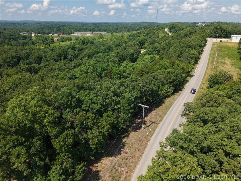 Discover the possibilities with this 6.8-acre wooded tract in - photo 5