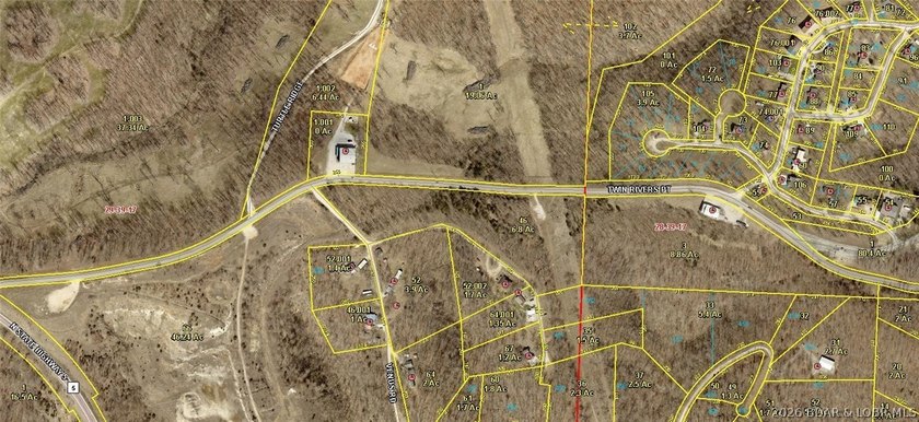 Discover the possibilities with this 6.8-acre wooded tract in - photo 7