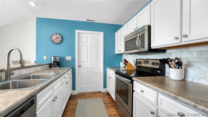 Welcome to this spacious 3 bedroom, 3 bath top-floor condo at - photo 8