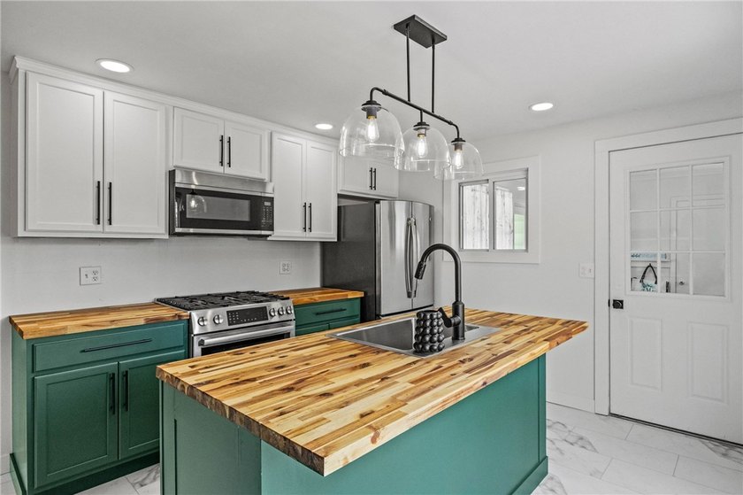 Welcome to 112 Sharon Drive, a beautifully updated 3-bedroom - photo 9