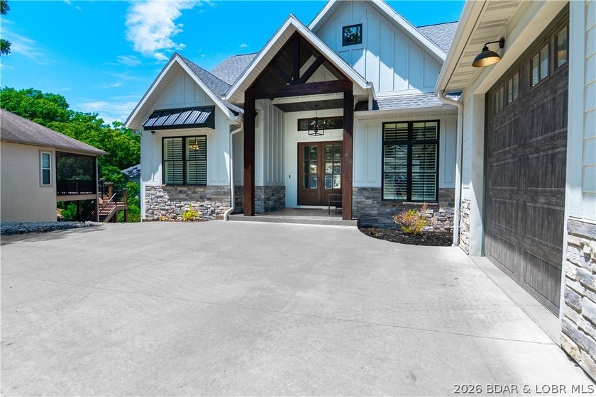 The ultimate Lake of the Ozarks retreat awaits in prestigious - photo 9