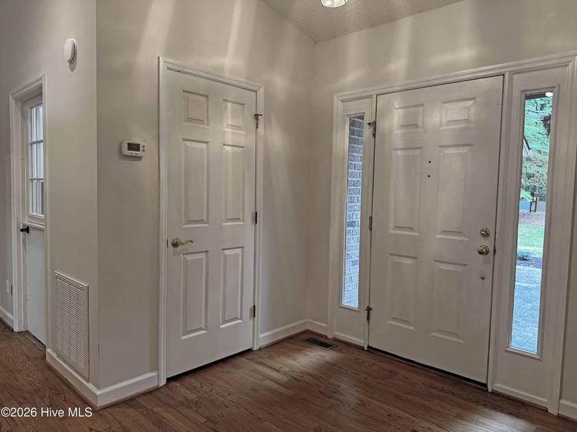 Enjoy peaceful waterfront living in this full-brick, 3-bedroom - photo 2