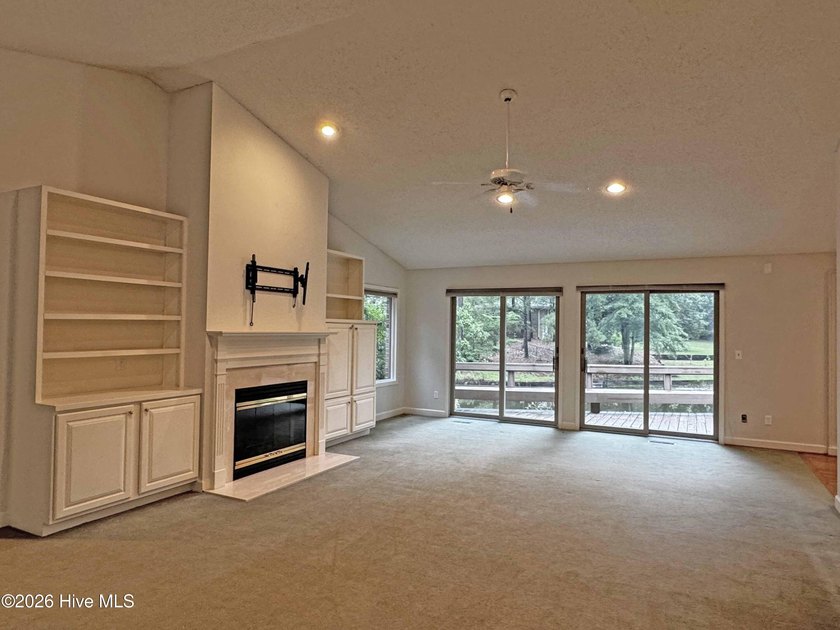 Enjoy peaceful waterfront living in this full-brick, 3-bedroom - photo 3