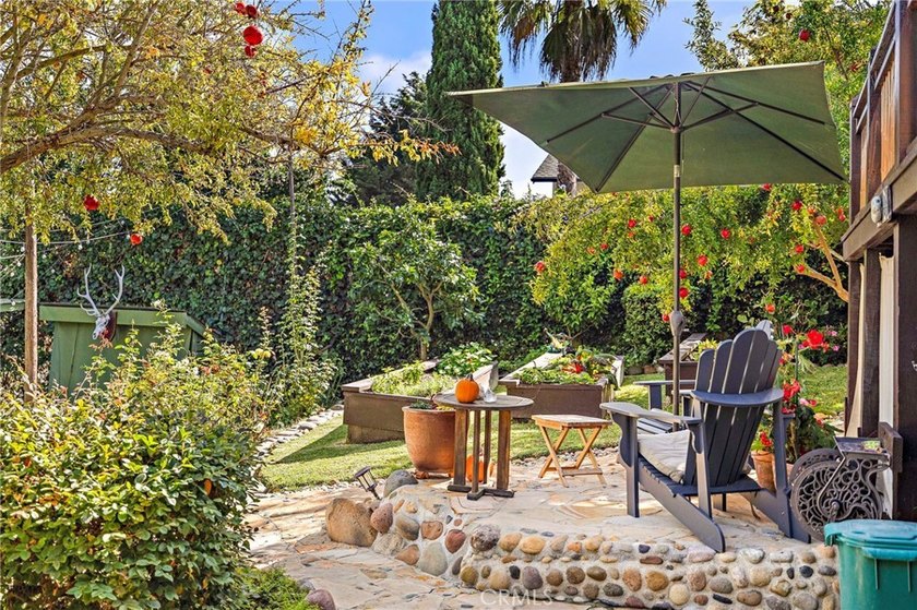 This beautifully maintained 4-bedroom, 3-bath home captures the - photo 22